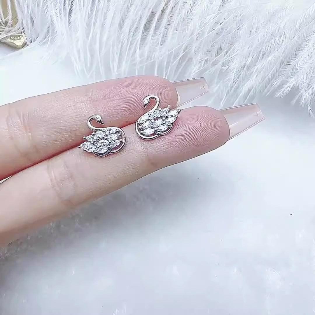 New sterling silver swan earrings | MODE BY OH